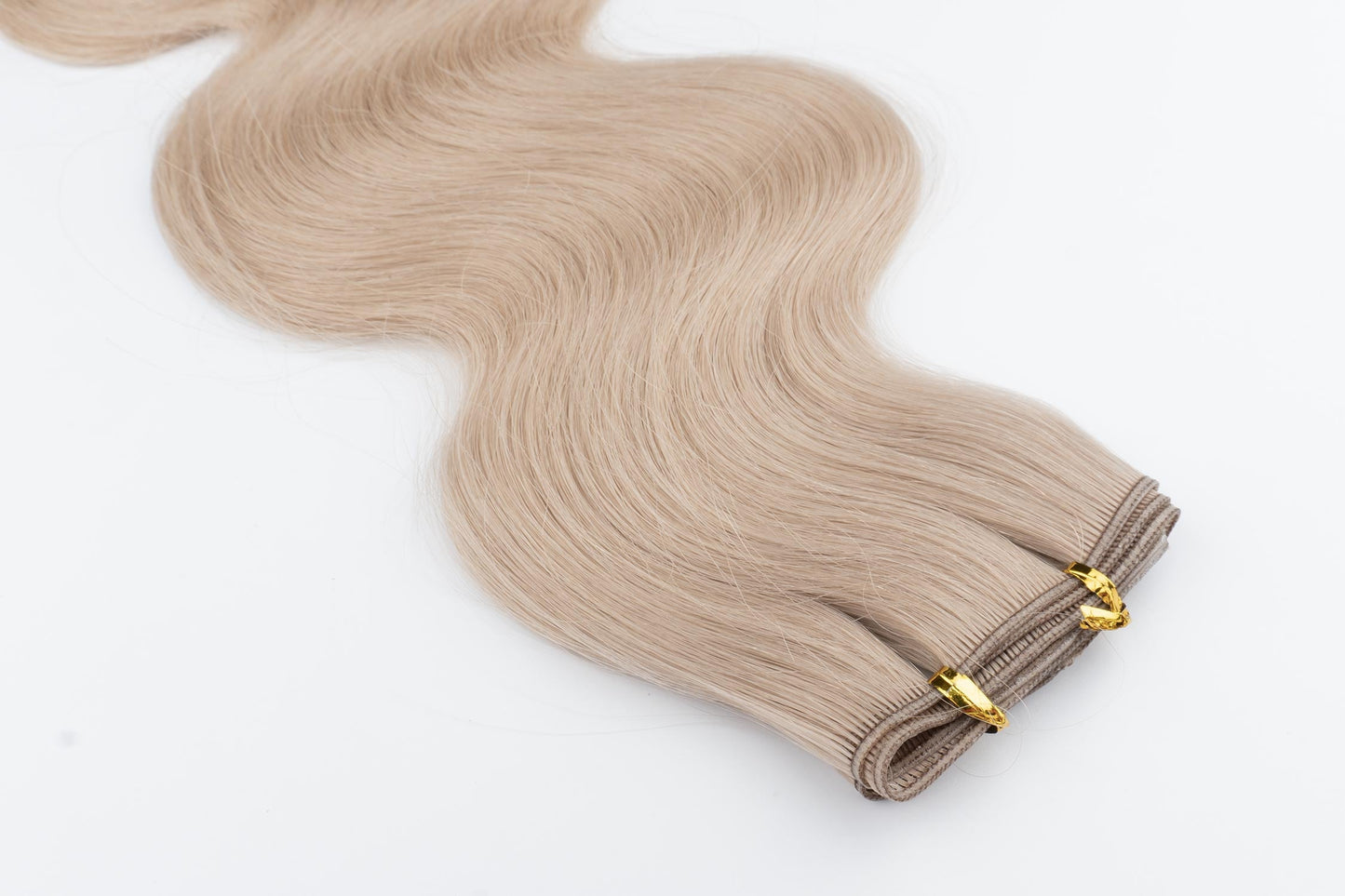 Wavy Tiny/Genius Weft 200 grams Remy Hair Extensions