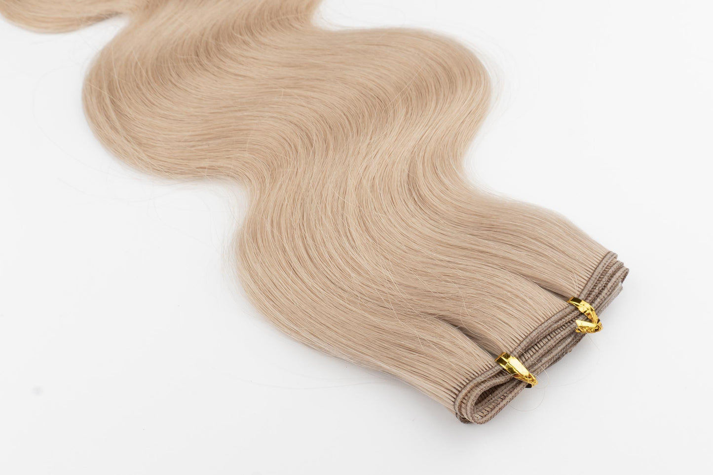 Wavy Tiny/Genius Weft 100 grams Remy Hair Extensions