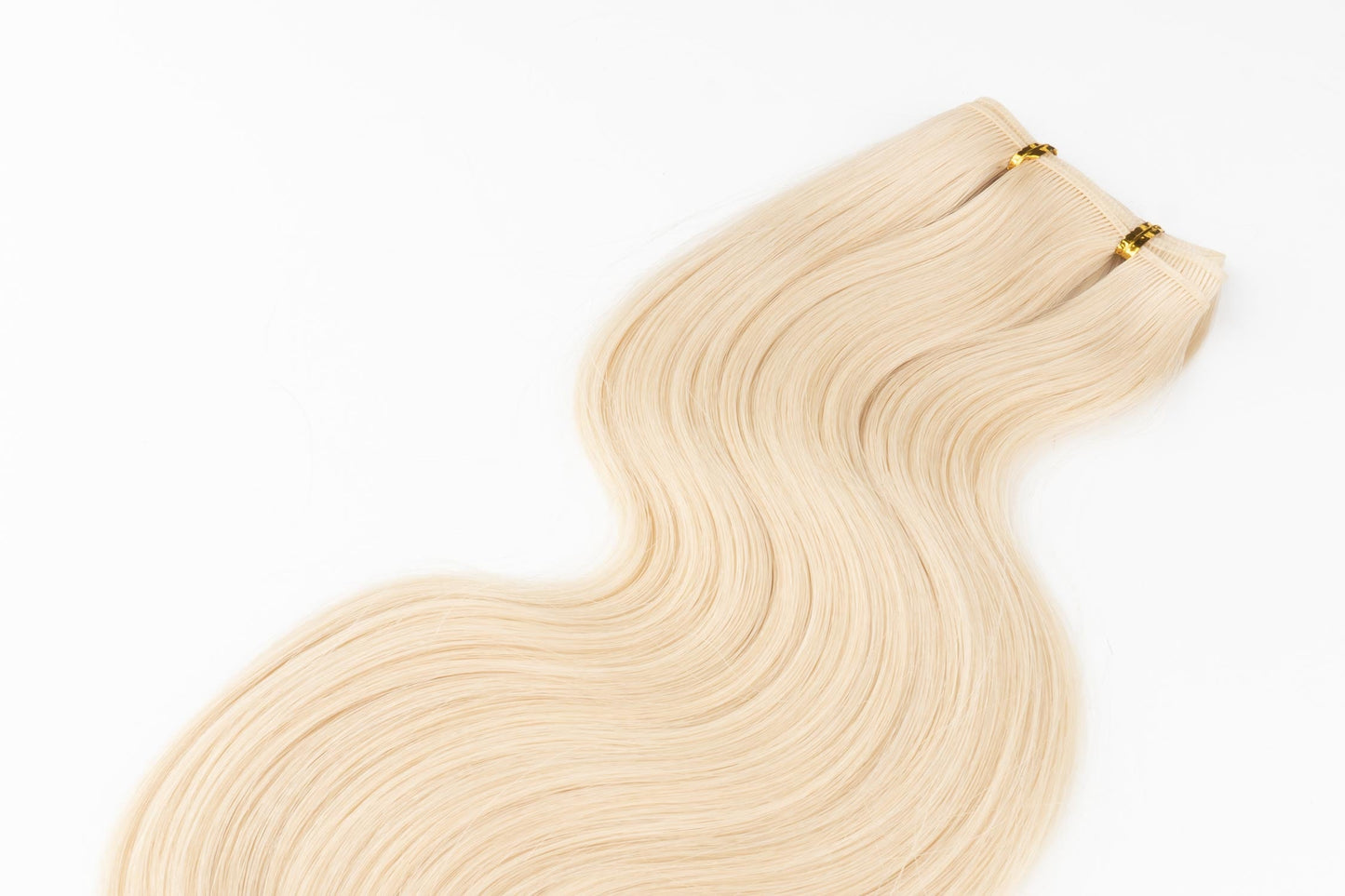Wavy Tiny/Genius Weft 100 grams Remy Hair Extensions