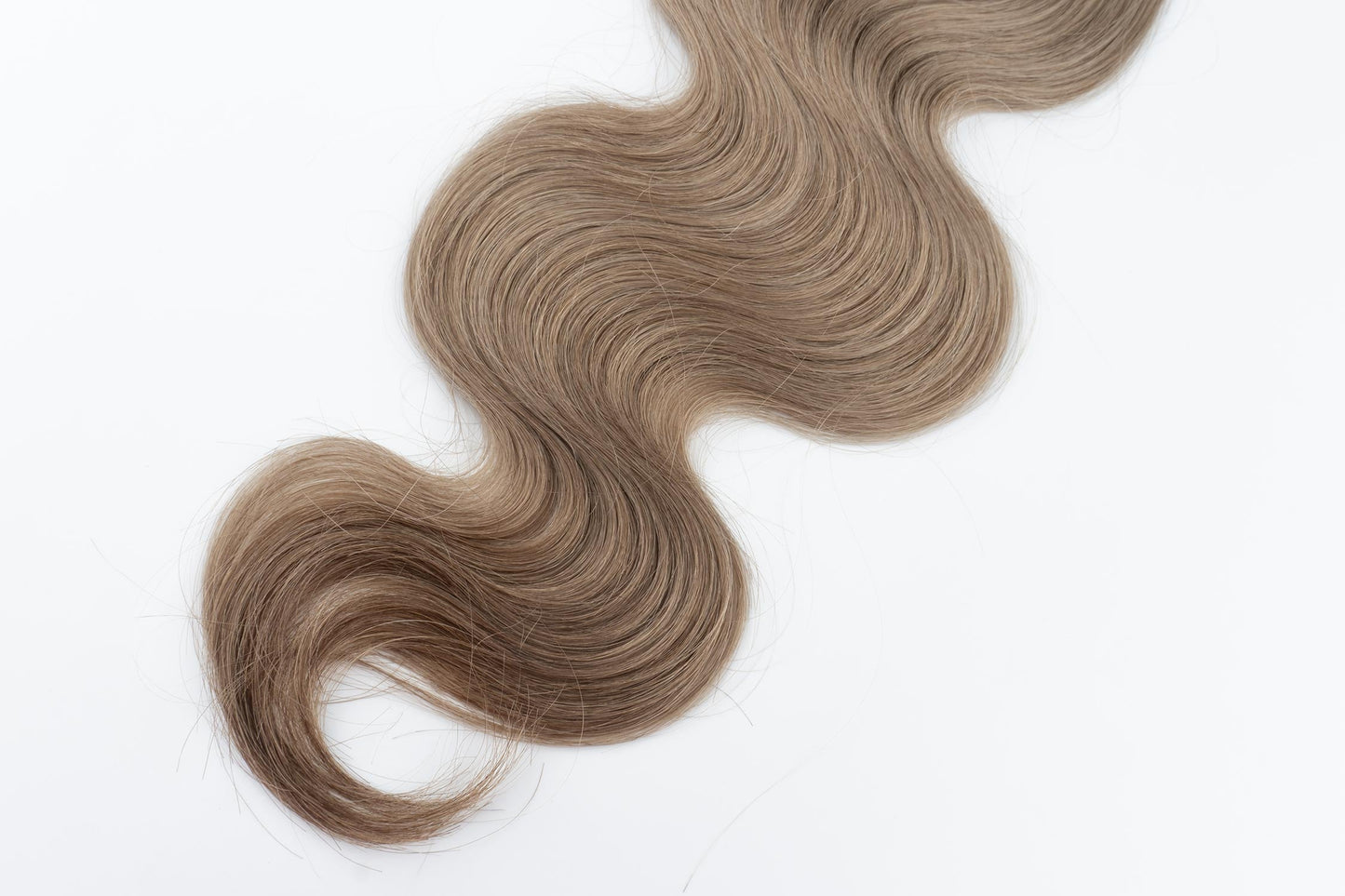 Wavy Tiny/Genius Weft 200 grams Remy Hair Extensions