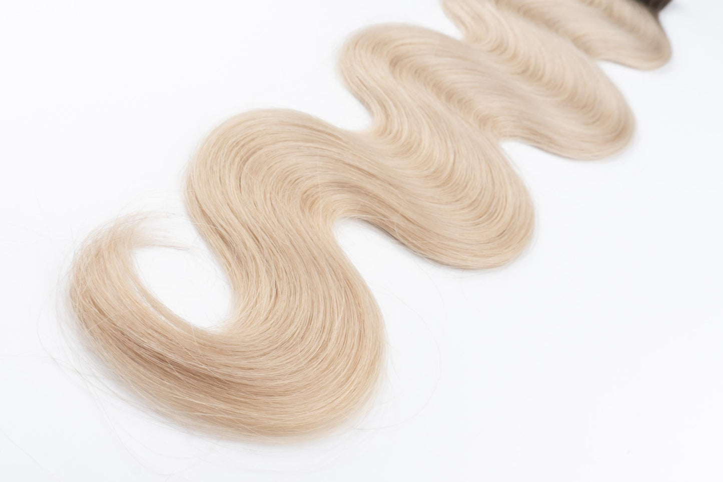 Wavy Tiny/Genius Weft 100 grams Remy Hair Extensions