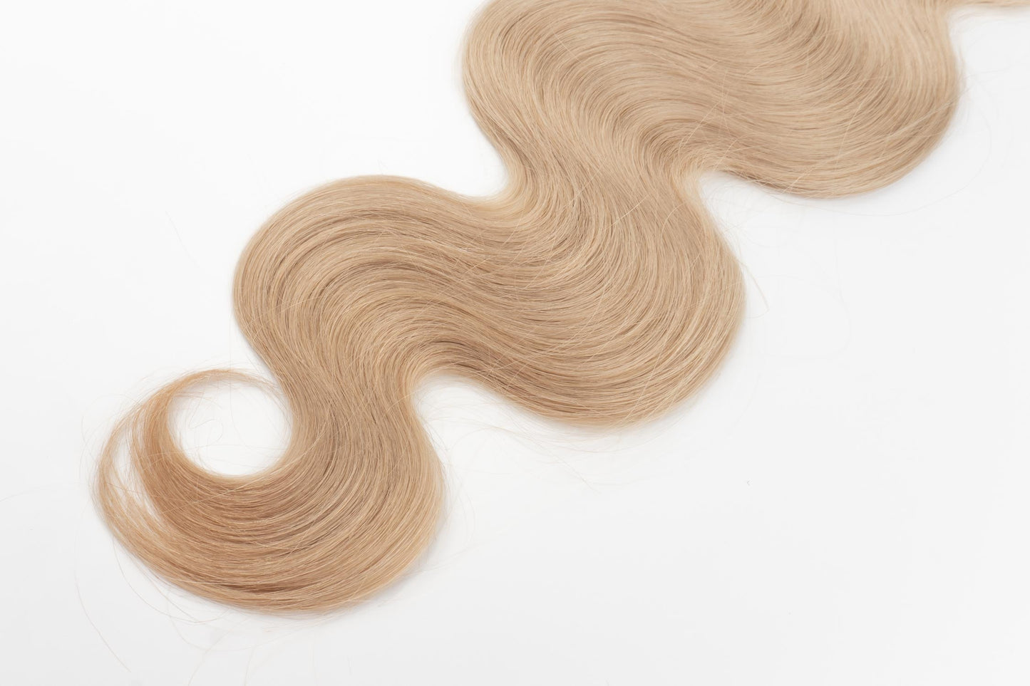 Wavy Tiny/Genius Weft 100 grams Remy Hair Extensions