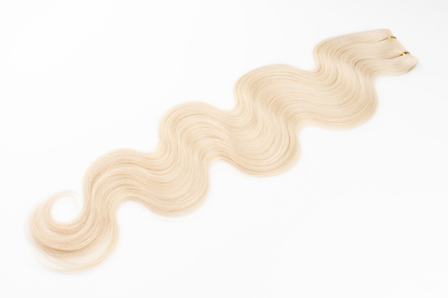 Wavy Tiny/Genius Weft 100 grams Remy Hair Extensions